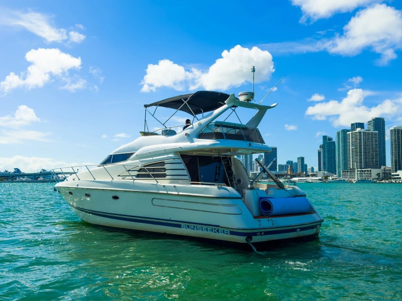 Yacht in front of the Miami skyline