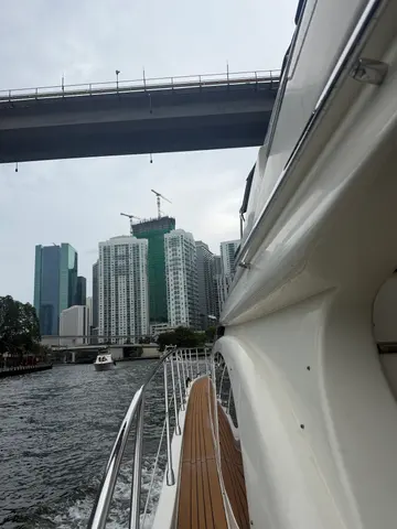 Cruising the Miami River under the bridge