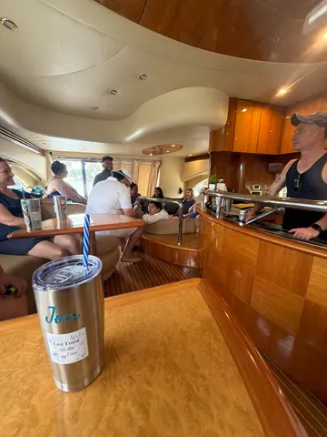 Guests relaxing in the yacht salon