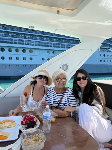 Lunch on deck beside a cruise ship