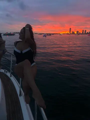 Guest on the bow at sunset